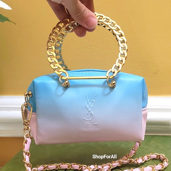 Yves Saint Laurent Handbags - Yves Saint Laurent blue and pink mini bag with circular handel
